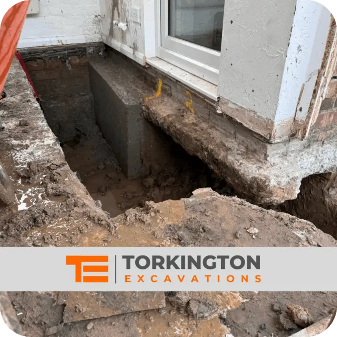 13-tonne excavator removing soil during earthworks project