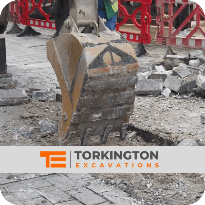 Hard landscaping with new retaining wall construction